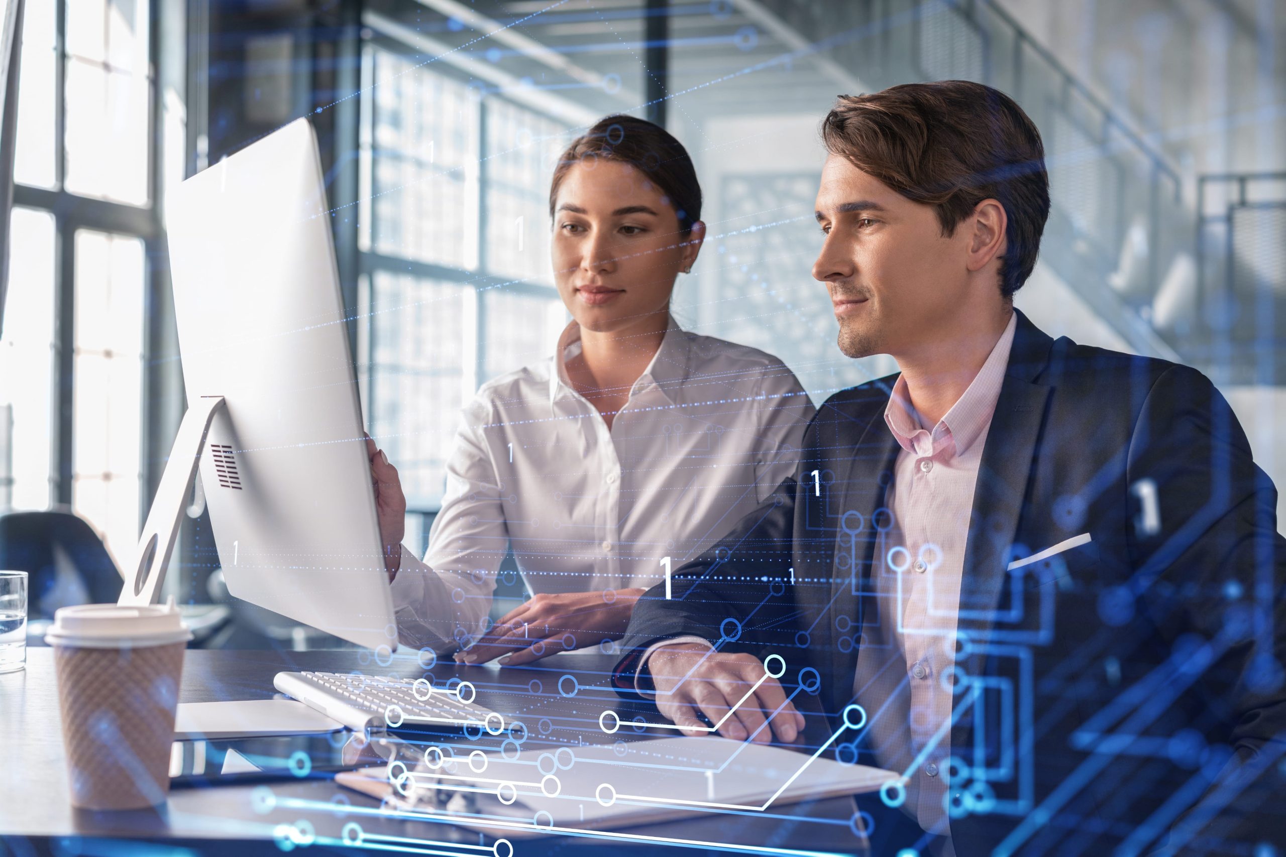 Business leaders reviewing digital integration data